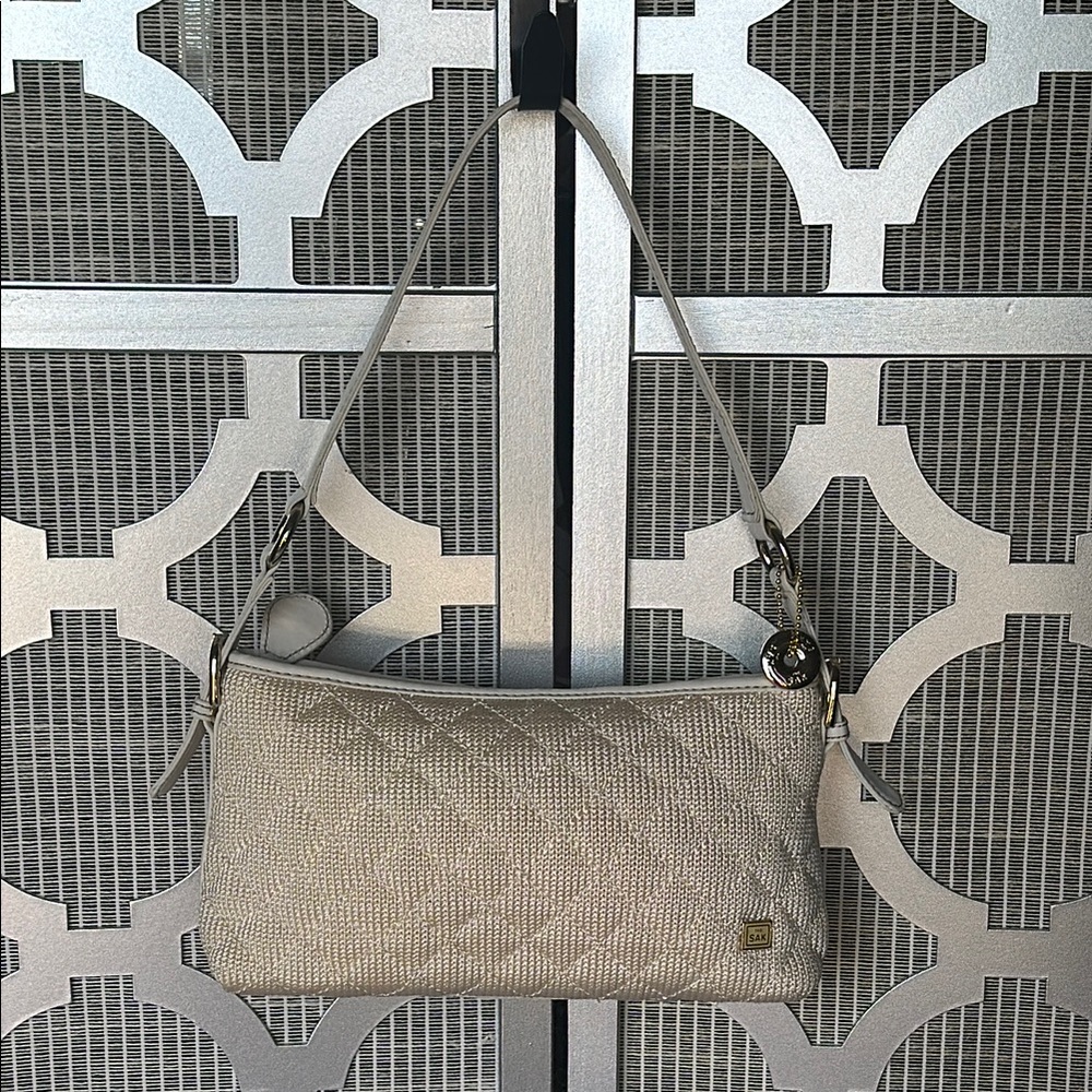 THE SACK Sleek Silver Shoulder Bag with Metallic Handle